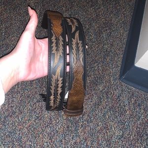 This best was bought brand new and has never been worn.